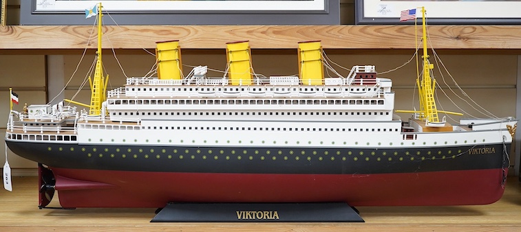 A modern Marklin clockwork tinplate ocean liner, 'Viktoria', on stand, hull 98cm long. Condition - fair, some losses and wear